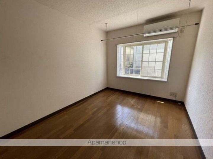 アリス東小泉第一105の居間