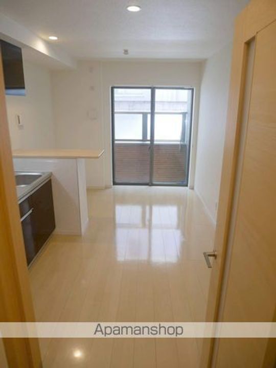 大阪府堺市堺区甲斐町西3丁の賃貸アパートの居間