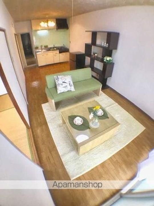 滋賀県野洲市行畑2丁目の賃貸マンションの居間