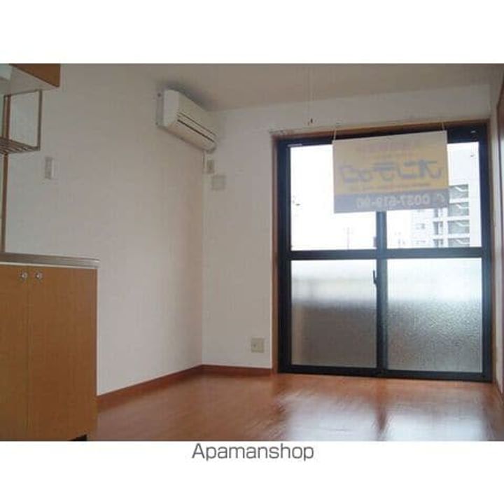 岐阜県美濃加茂市加茂野町今泉の賃貸マンションの居間