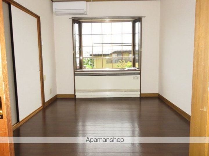 ハイツM A棟102の居間