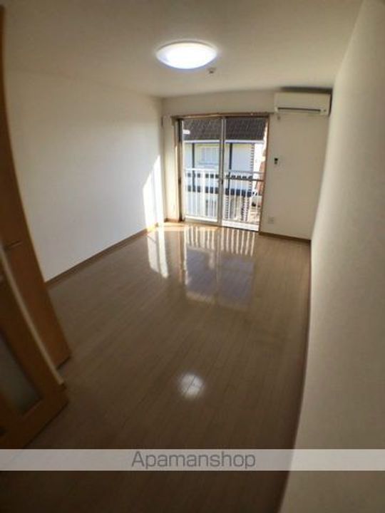 ベル プロムナードわたむき207の居間