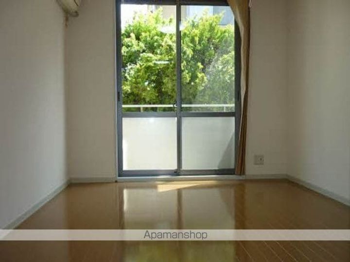 メゾンフィオーレA201の居間