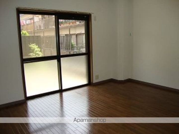 愛知県名古屋市西区比良1丁目の賃貸マンションの居間