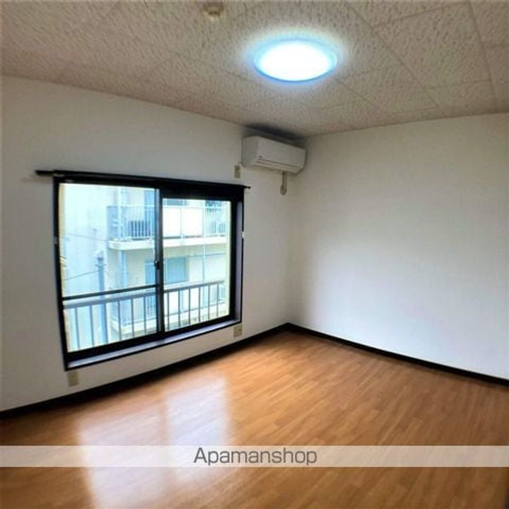 滋賀県湖南市中央5丁目の賃貸マンションの居間