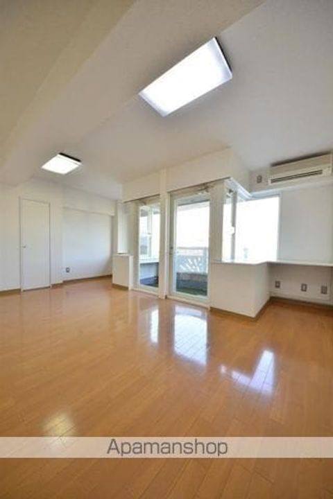 東京都八王子市北野町の賃貸マンションの居間