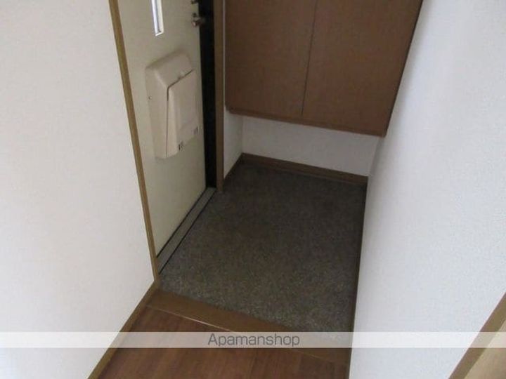 T−スクエアA・BA202の玄関