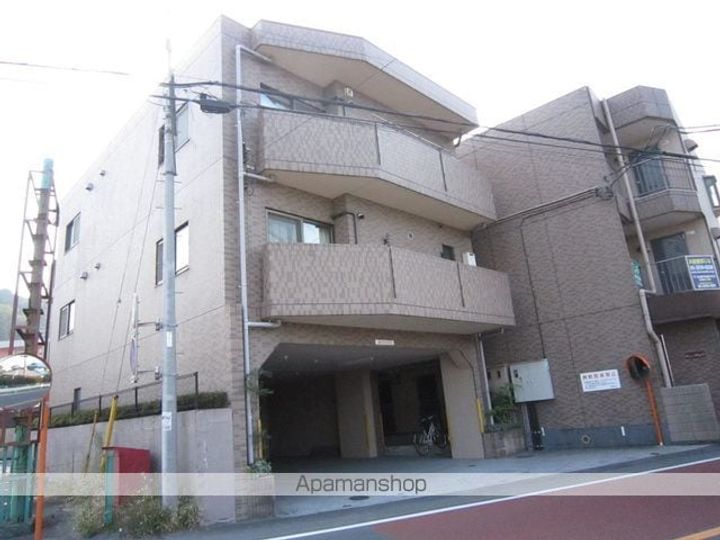 埼玉県入間市大字仏子の賃貸マンションの外観