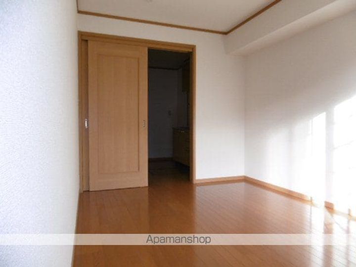 ベルソレイユA101の居間