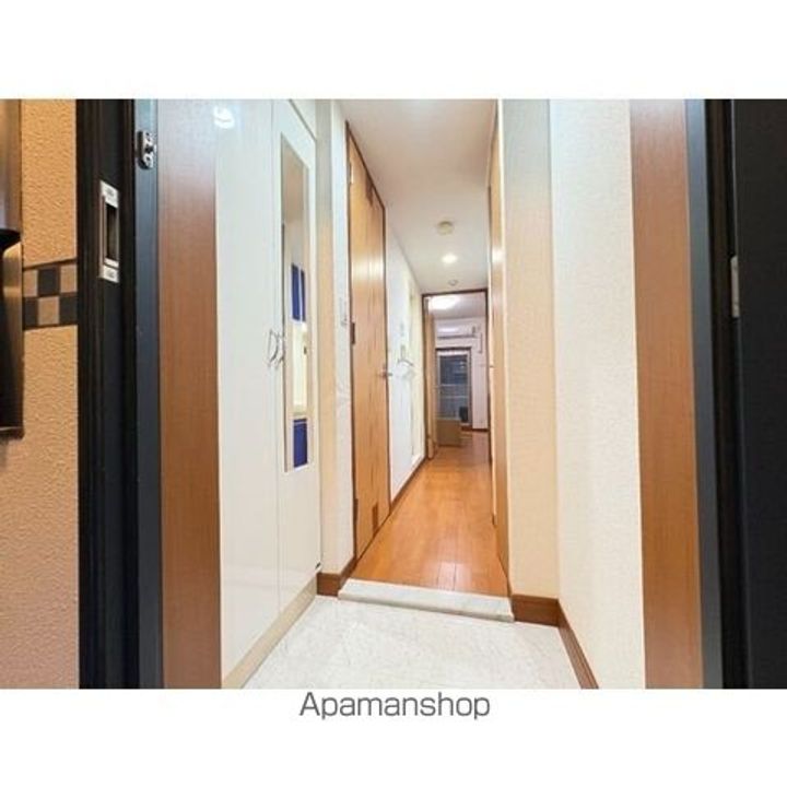 プレサンス泉セレグレード505の玄関