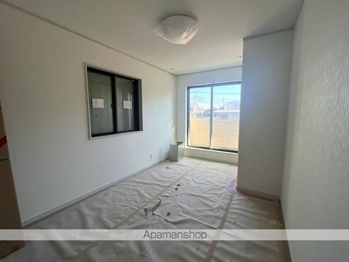 桧材仕様の単身物件 トレフル三郷中央205の居間