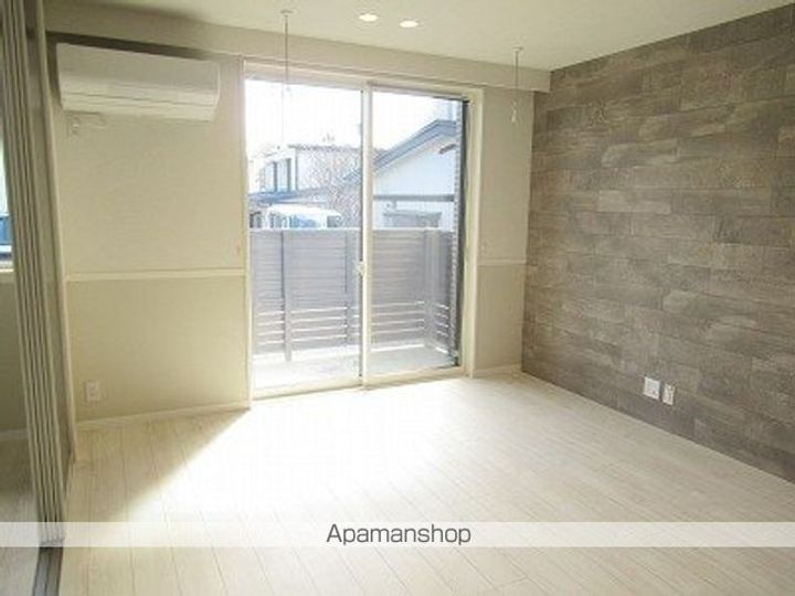 岩手県盛岡市緑が丘2丁目の賃貸アパートの居間
