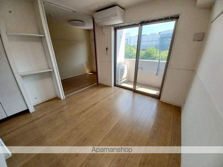 長野県松本市清水1丁目の賃貸マンションの居間