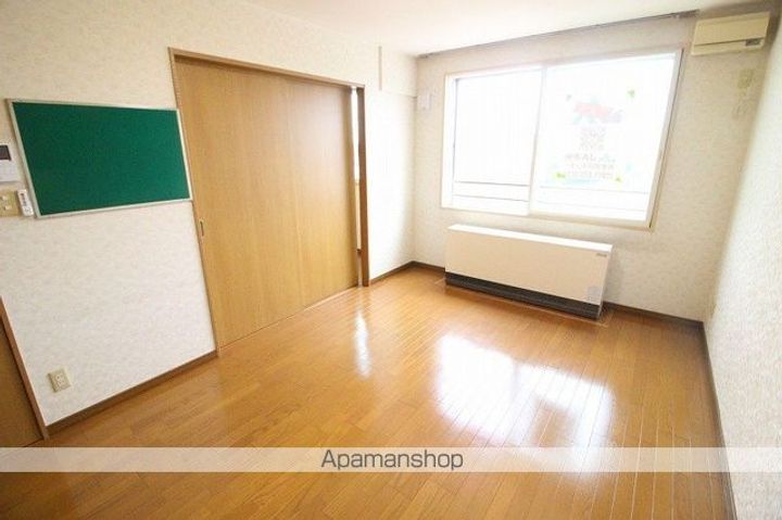 ユカンボシリバーハイツB307の居間