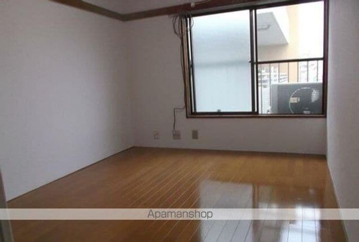 東京都中野区本町6丁目の賃貸アパートの居間