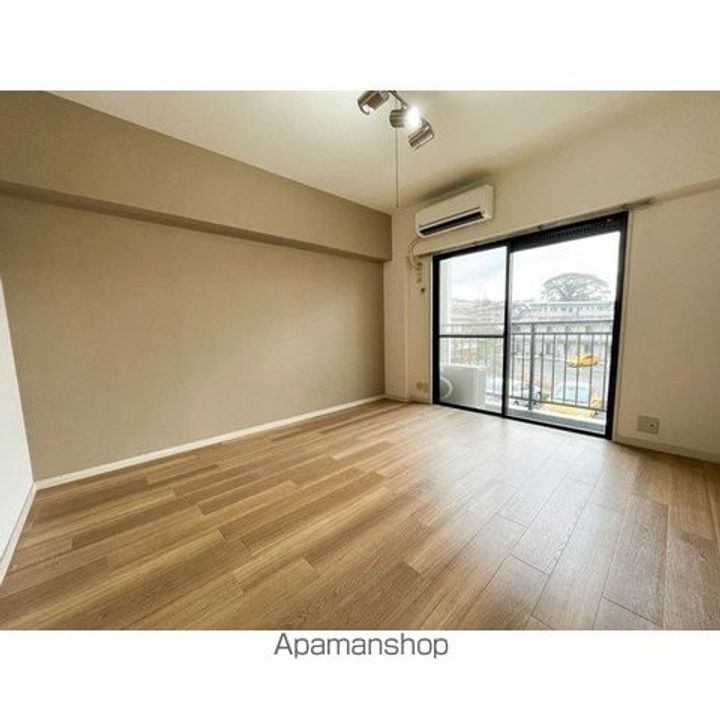 福岡県福岡市東区香椎駅東4丁目の賃貸マンションの居間