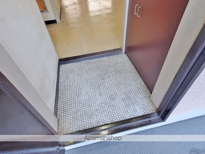 リバーサイドニッシン城東ハイツ601の玄関