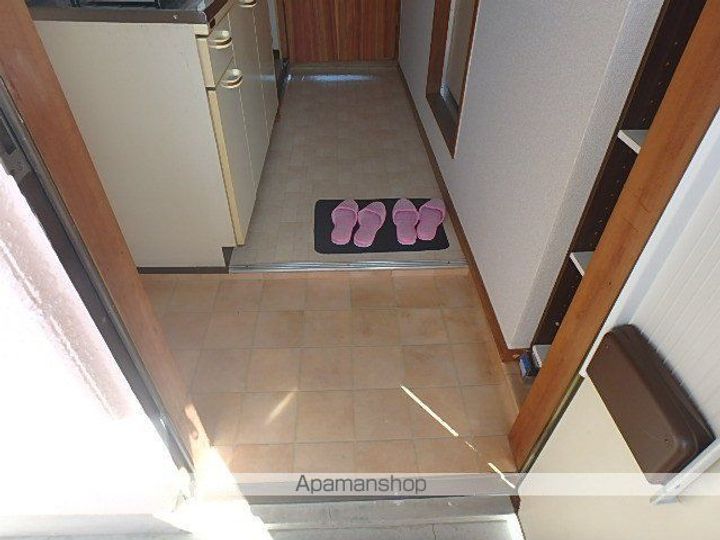 丸善コーポ207の玄関