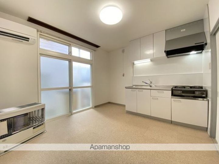 グリーンハウス人見102の居間