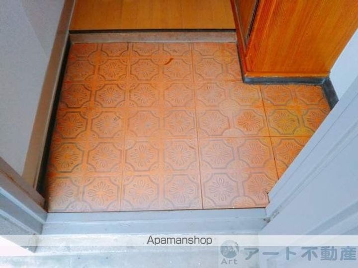 愛媛県松山市石手4丁目の賃貸マンションの玄関