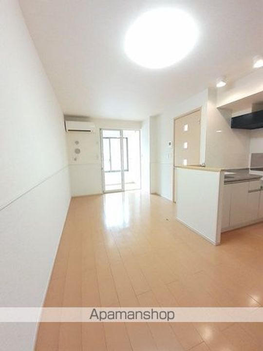 広島県福山市新涯町4丁目の賃貸アパートの居間