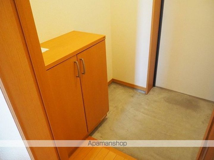 マンションMK103の玄関