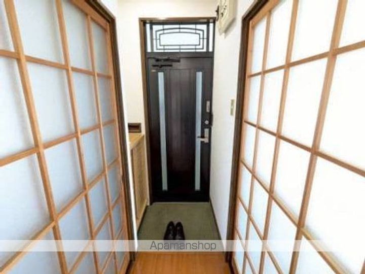 ガーデンシティハウスA棟203の玄関