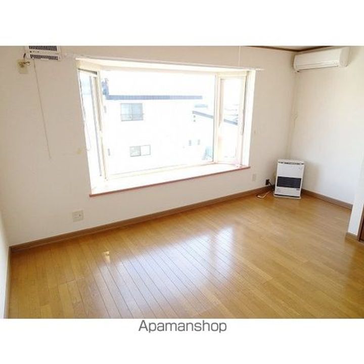 ローヤルハイツ202の居間