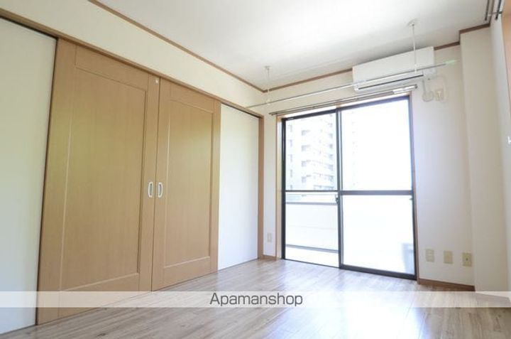 ベルバランセパークサイド203の居間