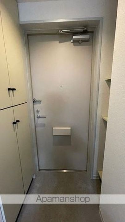 エスタ梅ヶ丘209の玄関