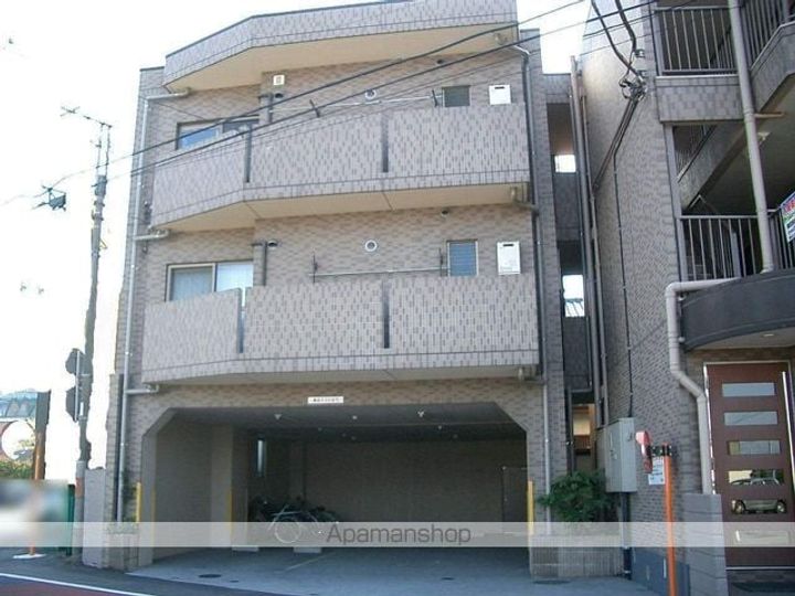 埼玉県入間市大字仏子の賃貸マンションの外観