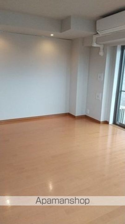 東京都豊島区東池袋2丁目の賃貸マンションの居間