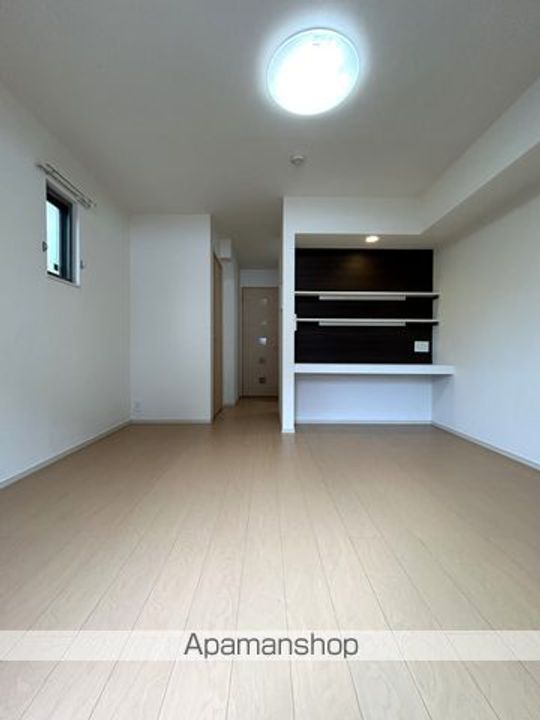 大阪府泉佐野市葵町3丁目の賃貸アパートの居間