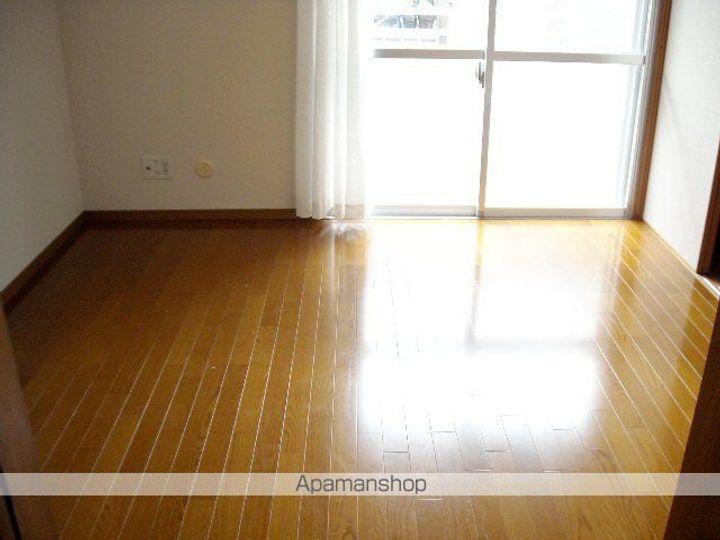 長野県松本市石芝3丁目の賃貸マンションの居間