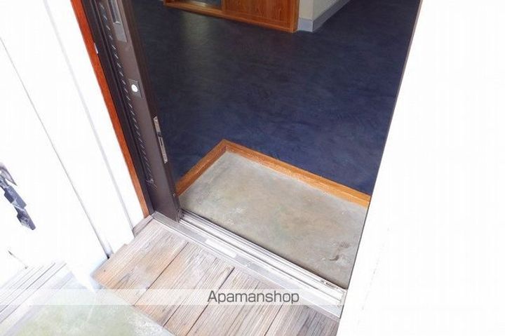 メゾンアルパ宮町502の玄関