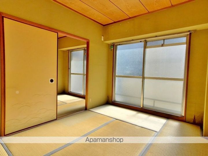 リバーサイドニッシン城東ハイツ601の居間