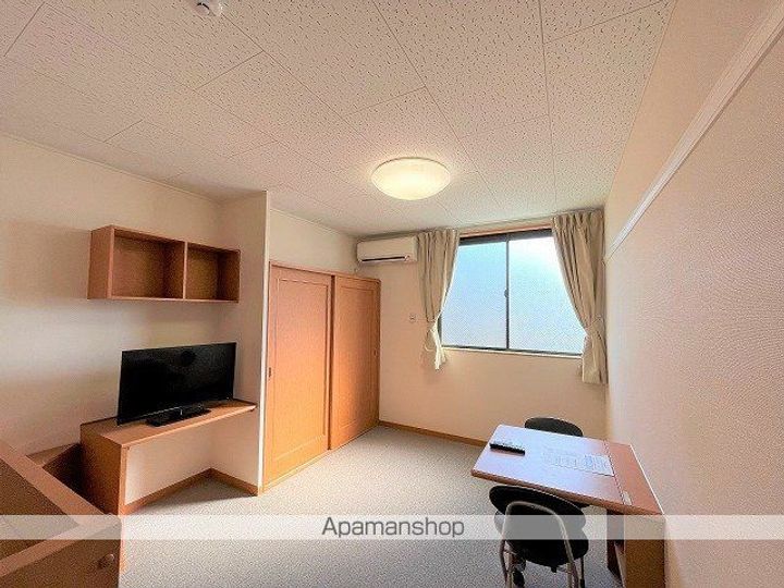 大阪府泉南市信達市場の賃貸アパートの居間