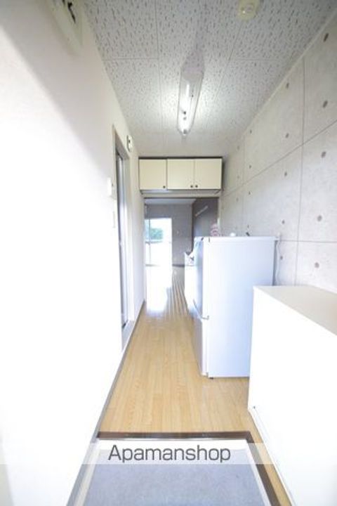 グリーンシャトル堀口203の玄関