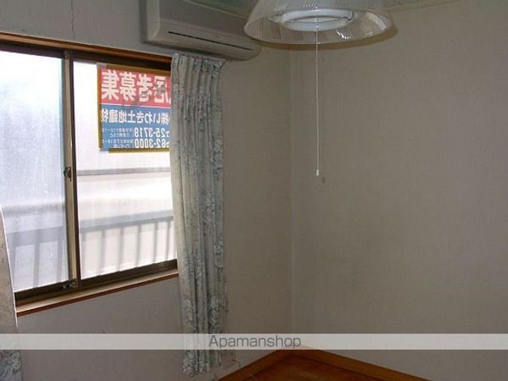 ヒルズキクヨ102の居間