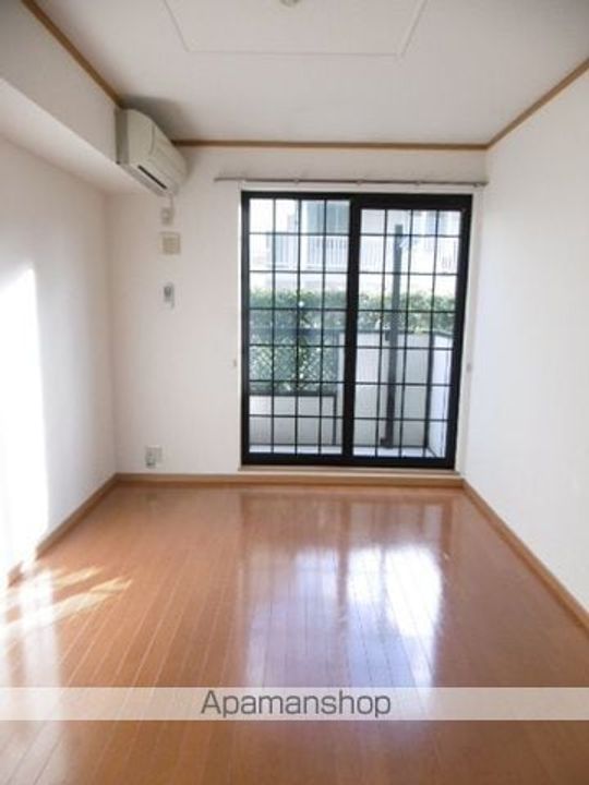 ベルソレイユA101の居間