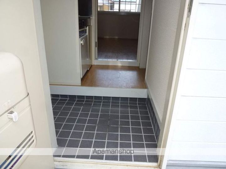 コスモハイツ泉の玄関