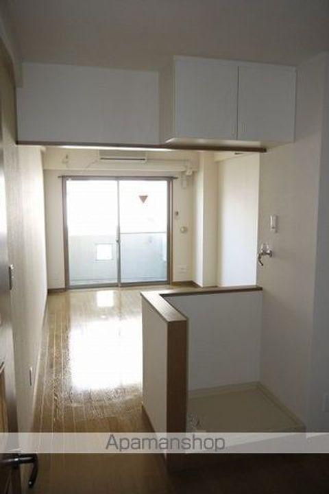 長野県松本市中央1丁目の賃貸マンションの居間