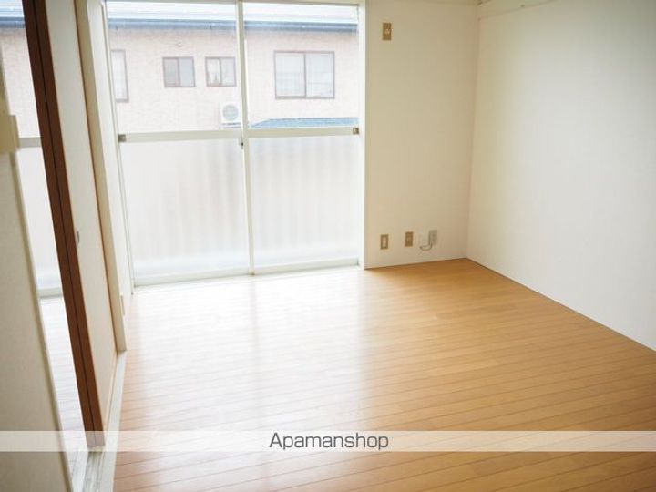 ハイツチェリー204の居間