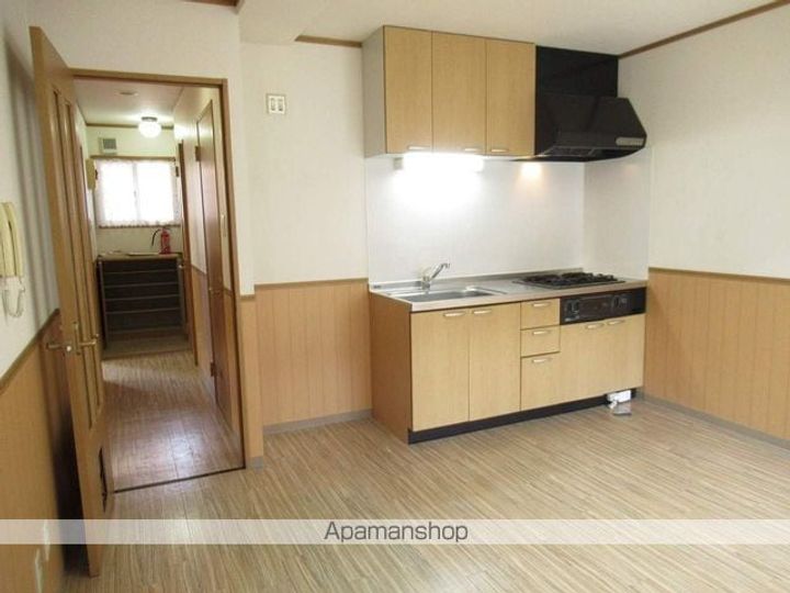 ロイヤルヒルズ中央通202の居間