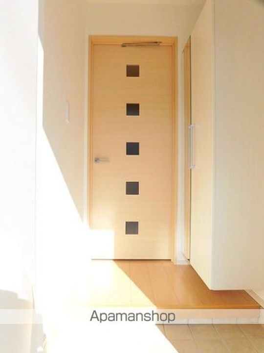 グラスコート Wの玄関