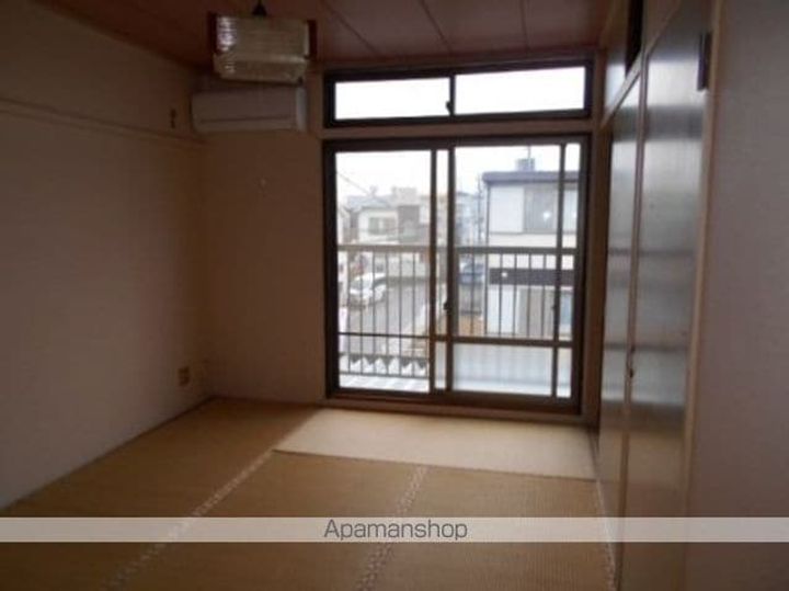 北総ビレッジ Aの居間
