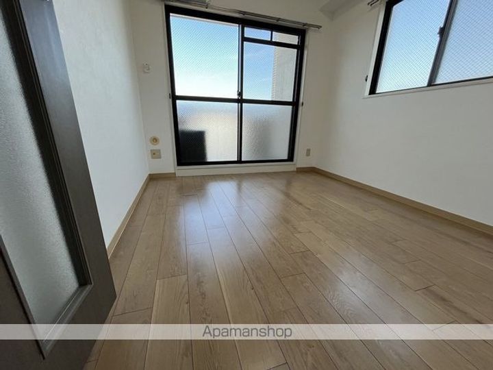 広島県広島市西区己斐本町2丁目の賃貸マンション606の居間