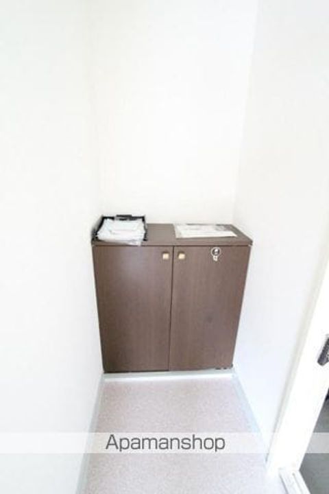 グリーンパークセジュールA・B・C棟B202の玄関