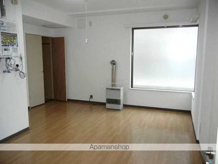 エトワール文京台201の居間