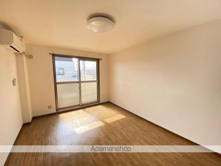 香川県高松市太田上町の賃貸マンションの居間